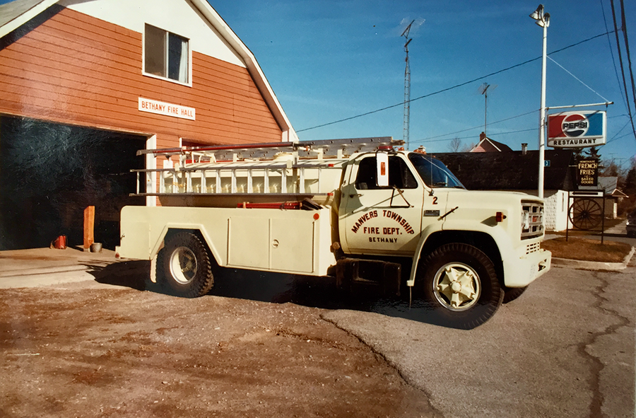 Pre amalgamation, Manvers Township Fire Dept (Bethany) Tanker 2, built on a General Motors cab and chassis made in Oshawa. Purchased used in Oakwood, outfitted and painted by firefighters. (c. 1985)